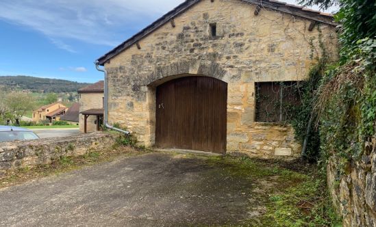 Easily accessible stone garage in the heart of a village 