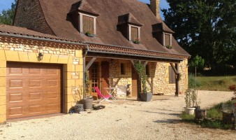 Contemporary four-bedroom house with swimming pool nestled in the hills above a peaceful village in the Périgord Noir.